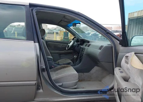 1999 Toyota Camry Ce/Le/Xle z USA, uszkodzony, nr VIN JT2BG22K5X0278572